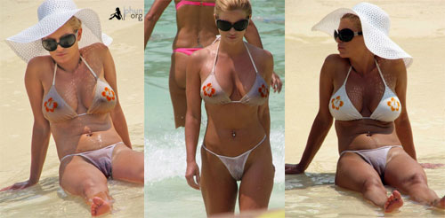 Jessica Simpson's bikini got wet and we got to see her pussy.